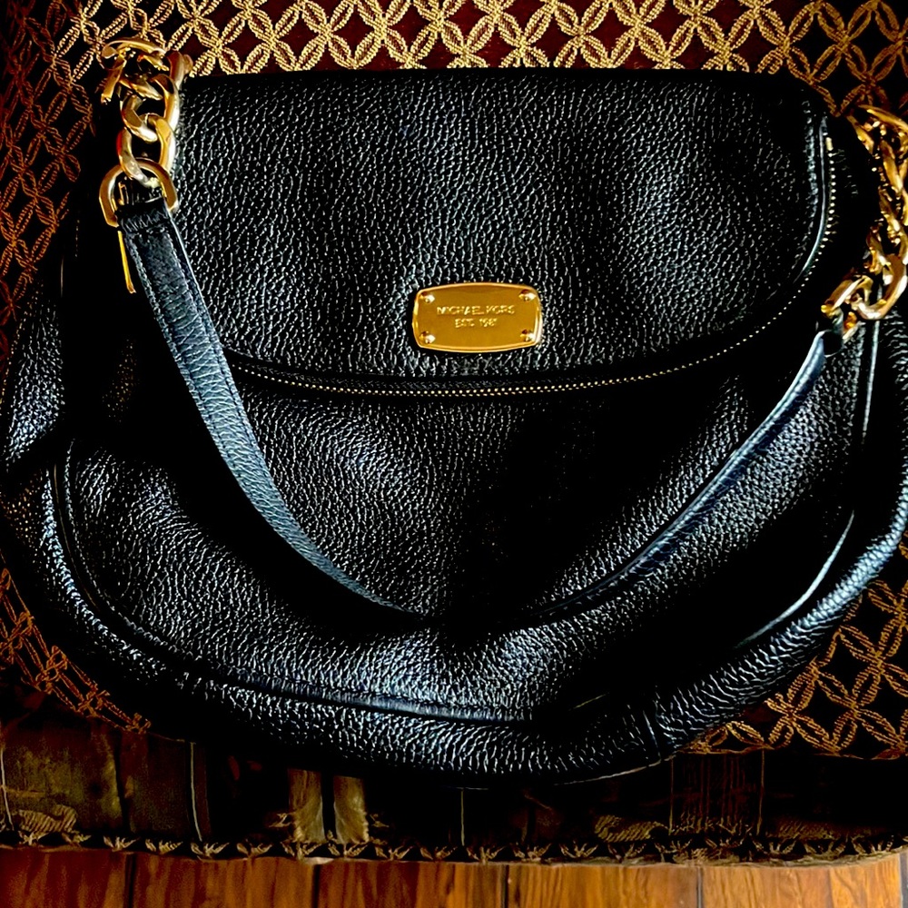 Black Michael Kors hand bag with gold hardware